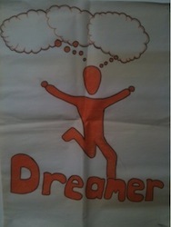 A picture of a red figure with the word 'dreamer' underneath him